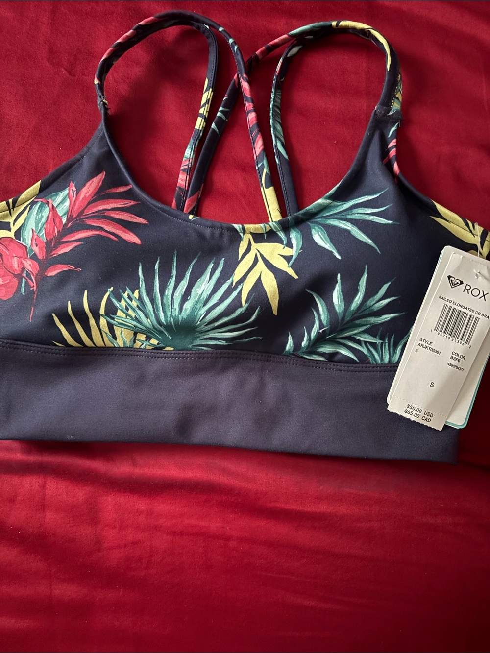 Roxy Kaileo Elongated CB Bra with tropical leaf print in red, green, and yellow